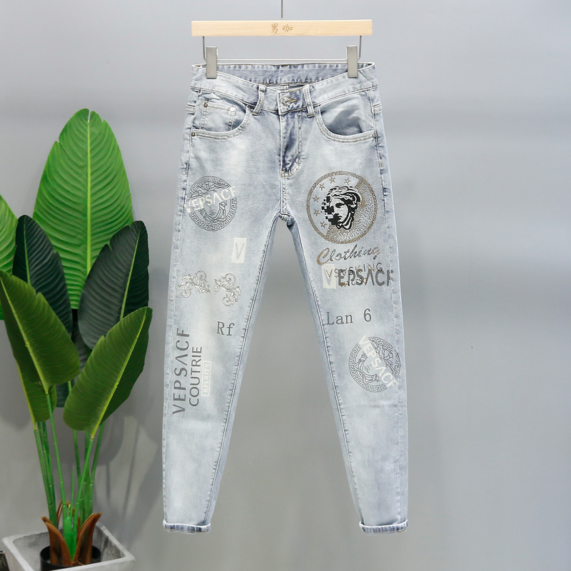 欧货高端男士小脚牛仔裤潮牌个性图案涂鸦印花烫钻网红浅蓝色长裤