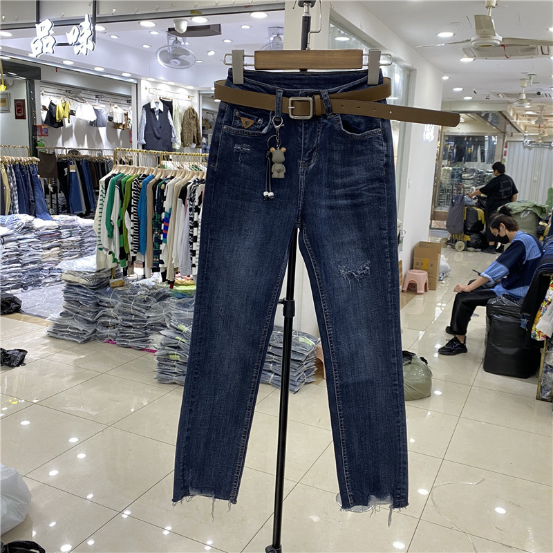 新款高腰弹力小直筒裤女秋季修身显瘦毛边破洞贴布牛仔裤