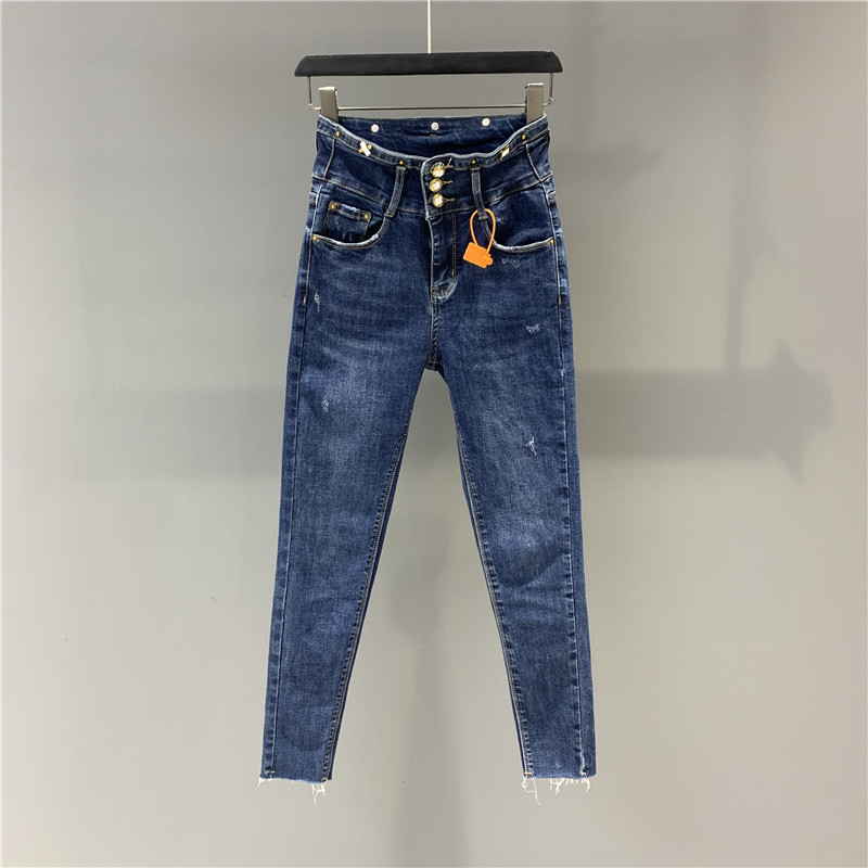 秋季新款排扣设计感小脚牛仔裤女百搭显瘦高腰毛边铅笔裤