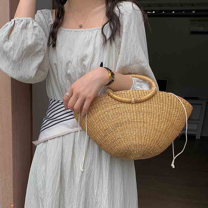 圆把法式草编包小众设计新款百搭大容量草包编织包手提藤编包
