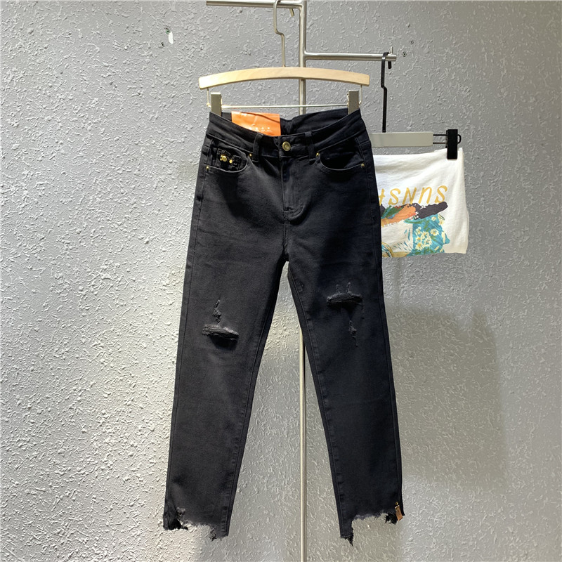 裤脚剪边膝盖剪破黑色小直筒牛仔裤欧货
